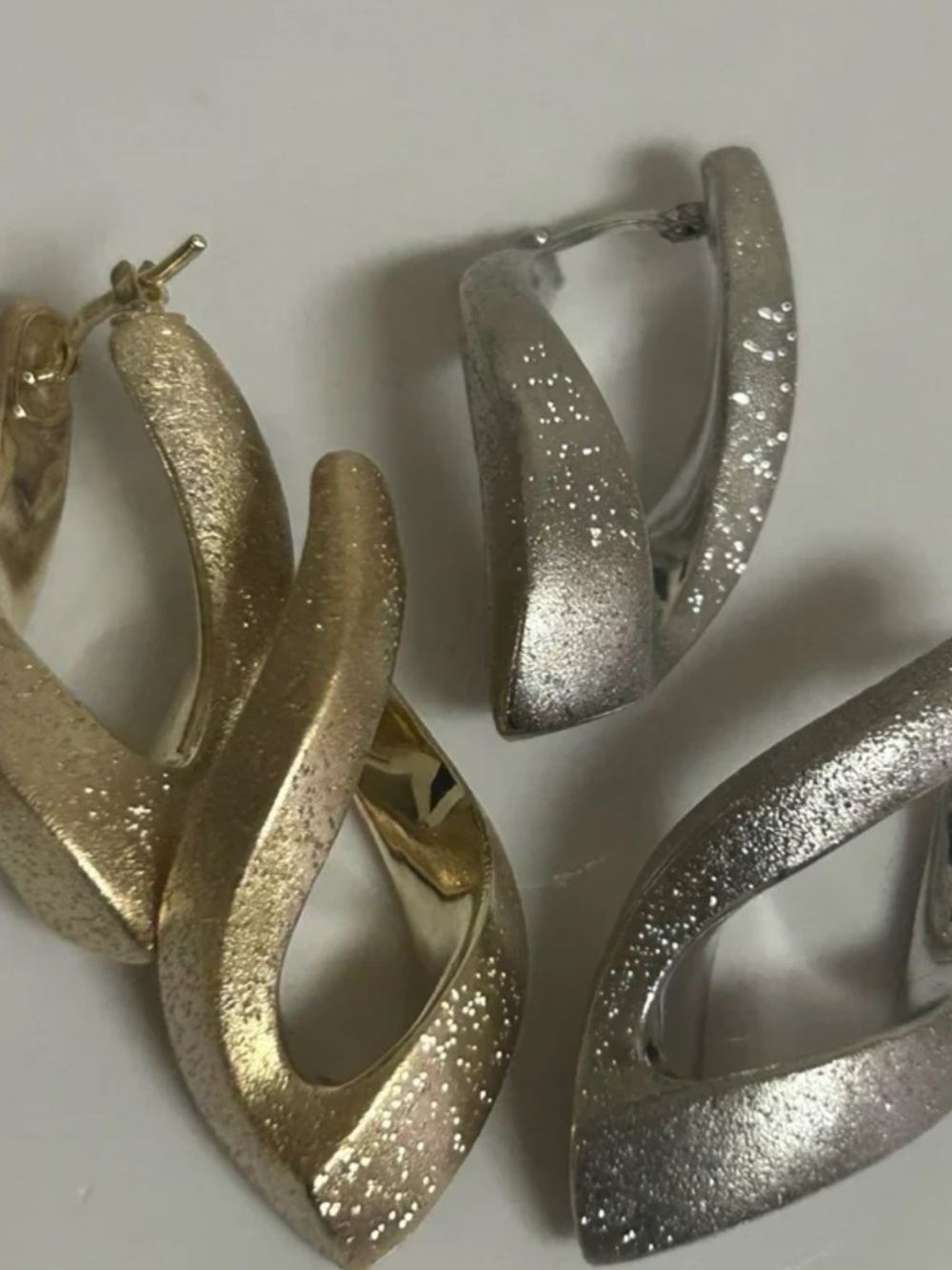 Bundle Charles Garnier Paris gold & silver sculptural ribbon hoop earrings lot